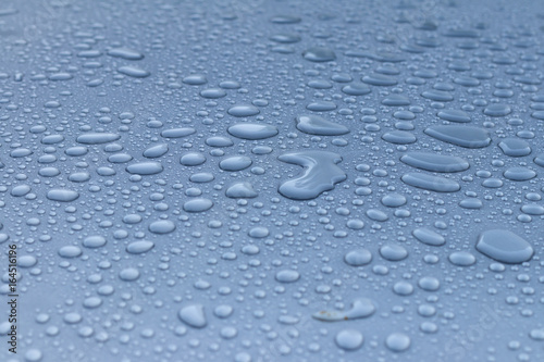 Dew drops on the roof of the car.