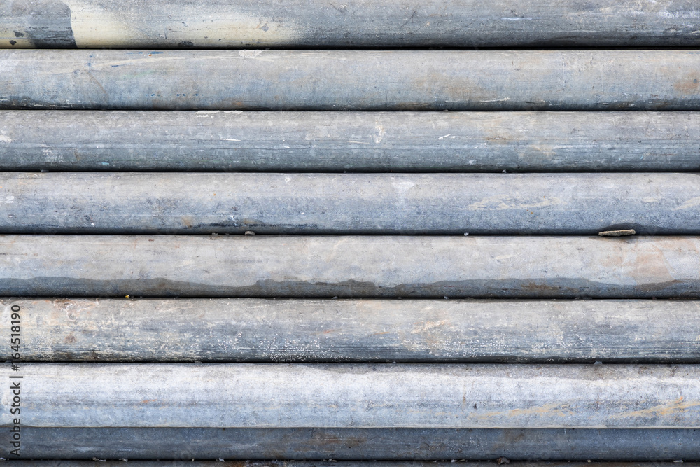 Old grey industrial scaffolding tube pipes