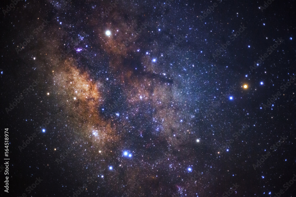 Naklejka premium The center of milky way galaxy. Long exposure photograph.with grain