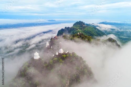 Fog on the Mountain.Wat Mongkut Memorial Rachanusorn a public temple on the hill. The wonderful thing is beautiful. It is located in Lampang, Thailand.Nature background. photo