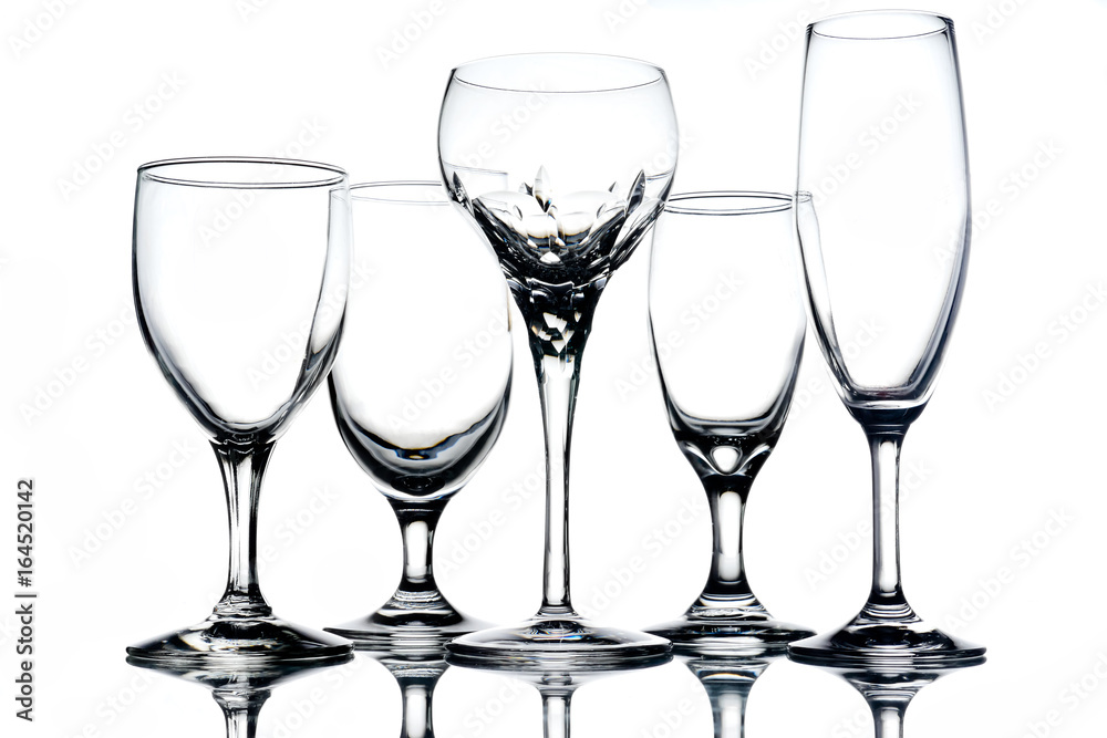 Collage of empty glasses on white background. Collage of empty glasses on white background.