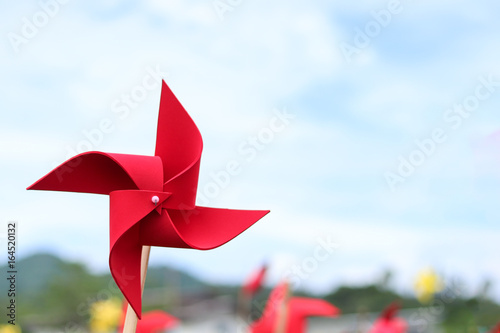 wind turbine toy with sky , save energy concept. 