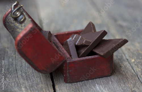 chocolate on old wooden plank