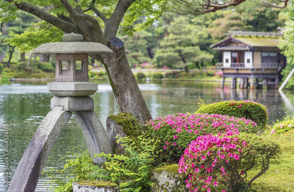 Stone Lantern in Japanese Garden Photos | Adobe Stock