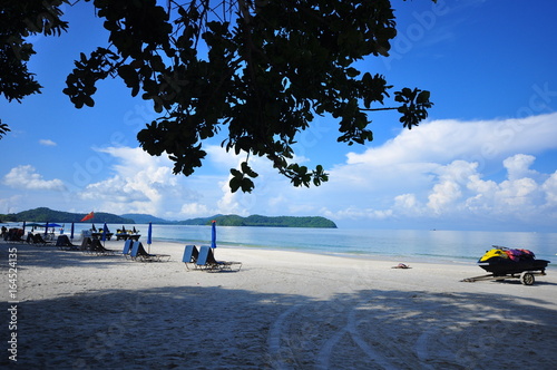  Banana boat and water jet ski at Pantai Cenang, the most popular beach on the Langkawi island photo