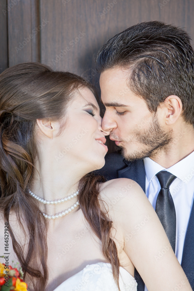 Happy just married couple kissing. wedding photo Happy just married couple kissing. wedding photo