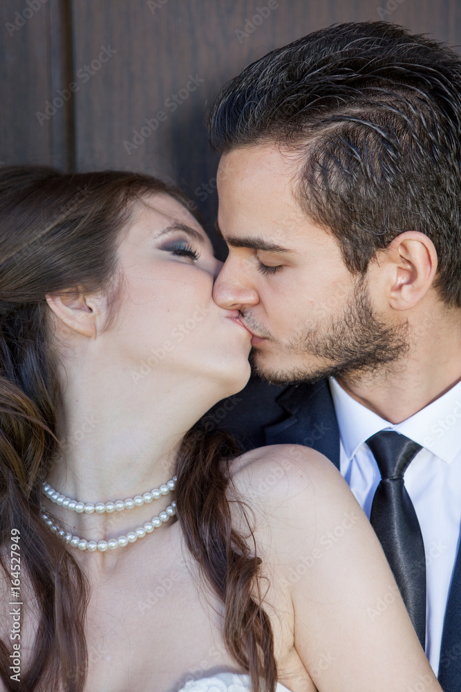 Happy just married couple kissing. wedding photo Happy just married couple kissing. wedding photo