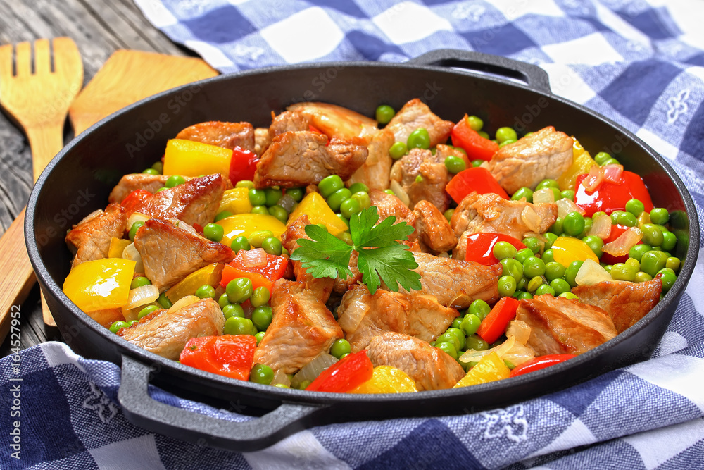 fried meat chunks with green peas fried meat chunks with green peas