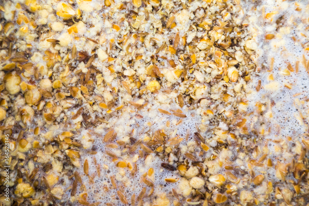 Mashing in a Stainless Kettle a Home Brew Cream Ale with Crushed Barley and Corn Mashing in a Stainless Kettle a Home Brew Cream Ale with Crushed Barley and Corn