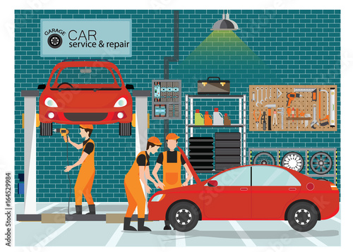 Car service and repair center or garage with worker.