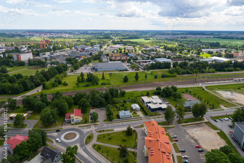 Aerial photography. Small city landscape, amazing clouds.