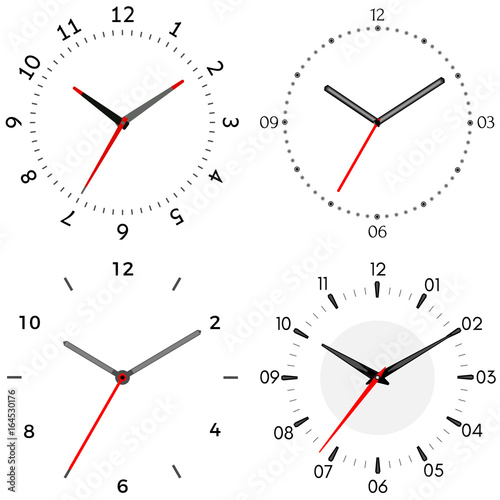 A set of four mechanical clocks. Clock face on white background.
