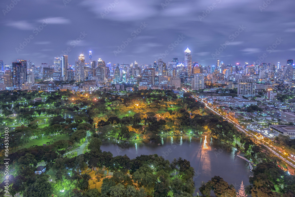 Obraz premium Twilight city tower building lights, cityscape downtown background