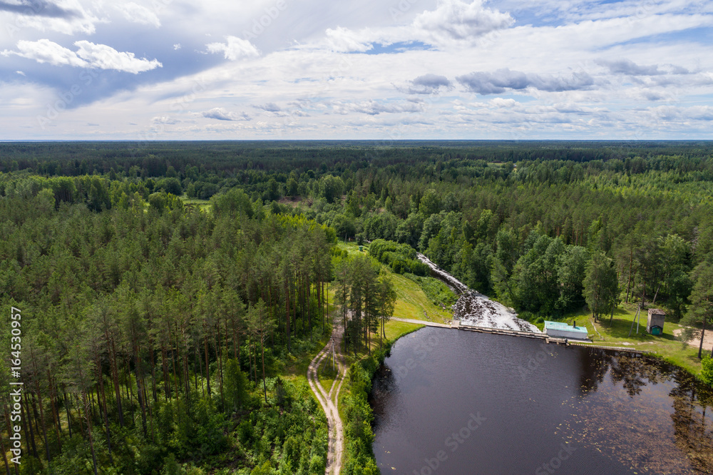 Aerial view of dam in Tudulinna, Estonia. Nature landscape. Summer.