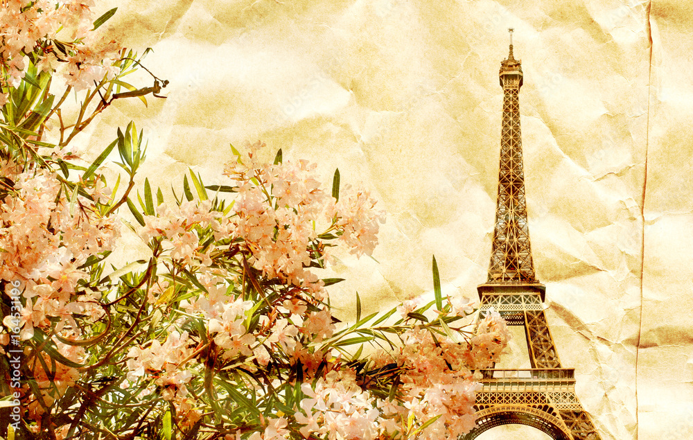 Grunge background with texture of old paper and Eiffel tower