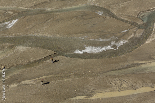 Scenery in the Himalayas, on the Annapurna Circuit, with dust storm and desert environment photo