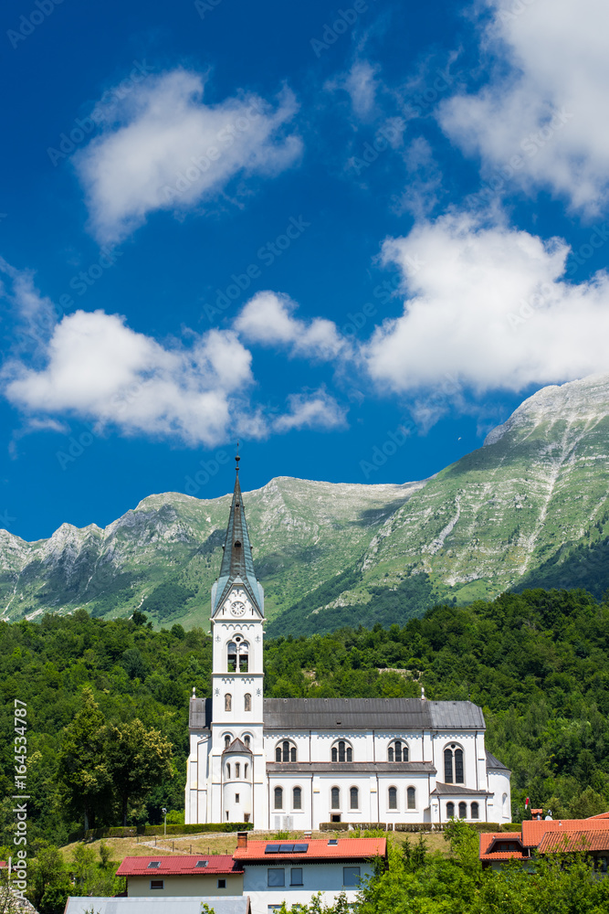 Fototapeta premium Dreznica church under Julian Alps in Triglav Park, Slovenia