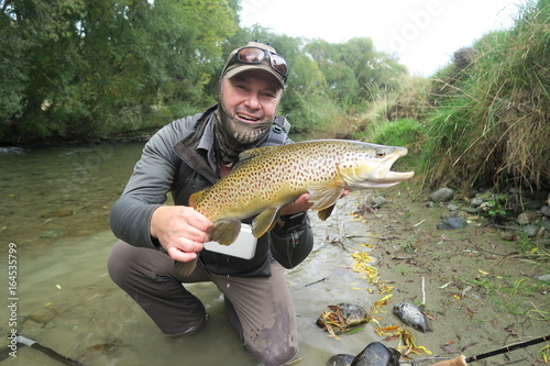 fly fishing new zealand river scene scenery trout