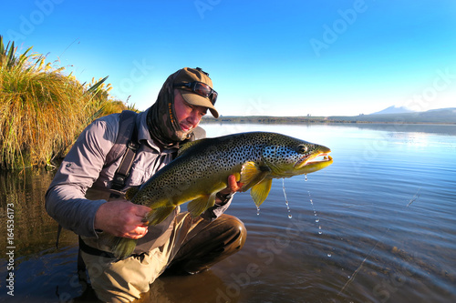Fototapeta Naklejka Na Ścianę i Meble -  fly fishing new zealand river scene scenery trout