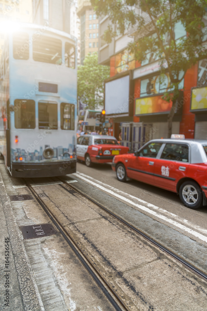 Obraz premium urban traffic road with cityscape in background in Hong Kong,China.