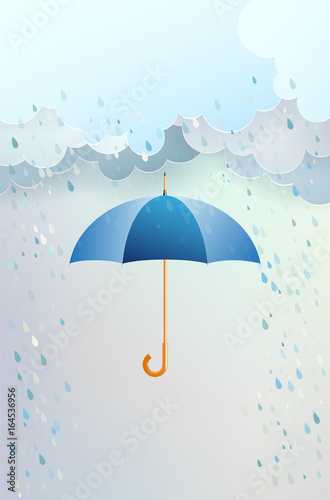 Blue opened umbrella and clouds with rain