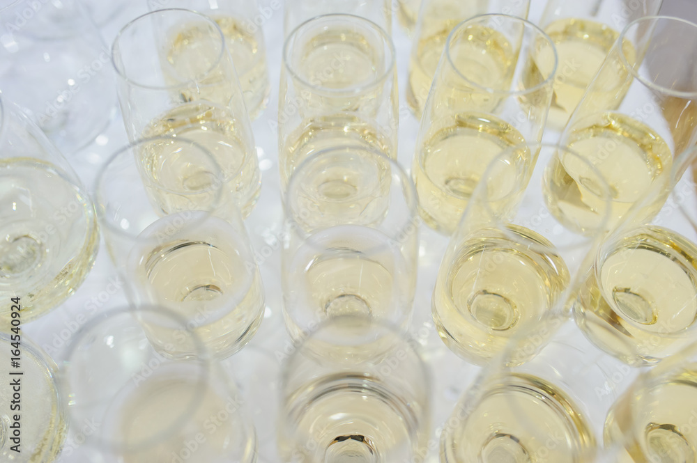 rows of glasses filled with champagne rows of glasses filled with champagne