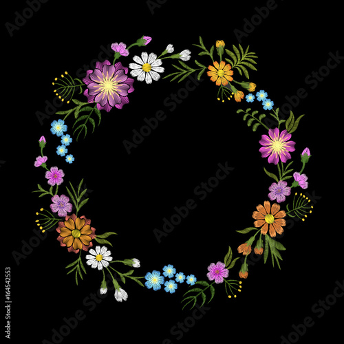 Floral blue violet daisy embroidery round arrangement. Vintage Victorian flower ornament fashion textile decoration. Stitch texture vector illustration