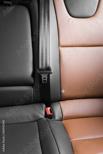 Part of black and red  leather car seat © gargantiopa