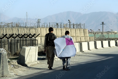 Papier peint Two Boys with a Kite in the City of in Kabul - Afghanistan