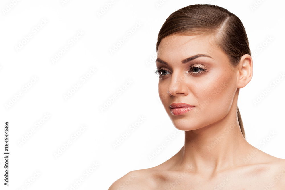 Gorgeous woman with natural make up on white background in studio photo Gorgeous woman with natural make up on white background in studio photo