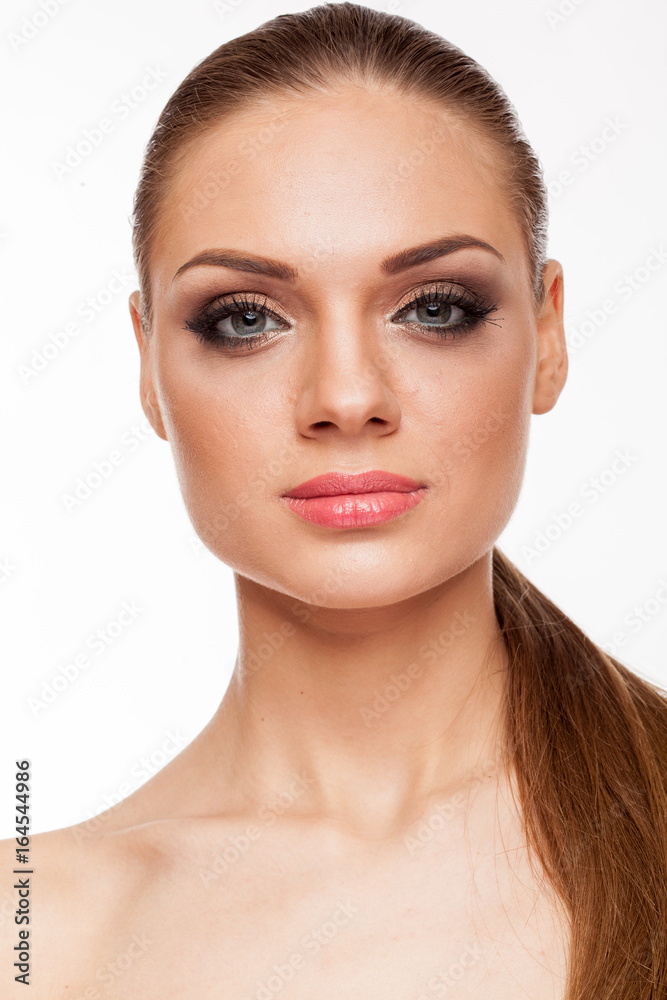 Blonde model with professional make up on white background Blonde model with professional make up on white background