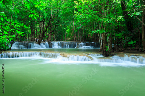 Deep forest waterfall at Huay Mae Kamin waterfall National Park Kanjanaburi Thailand