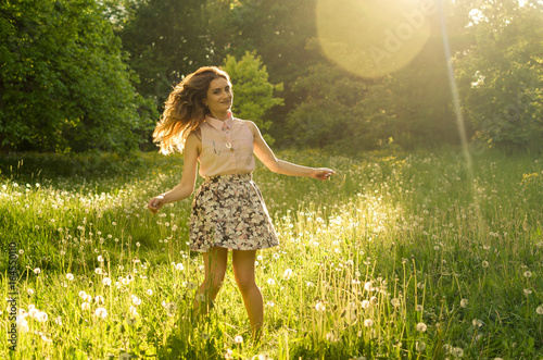 young girl in sunset photo