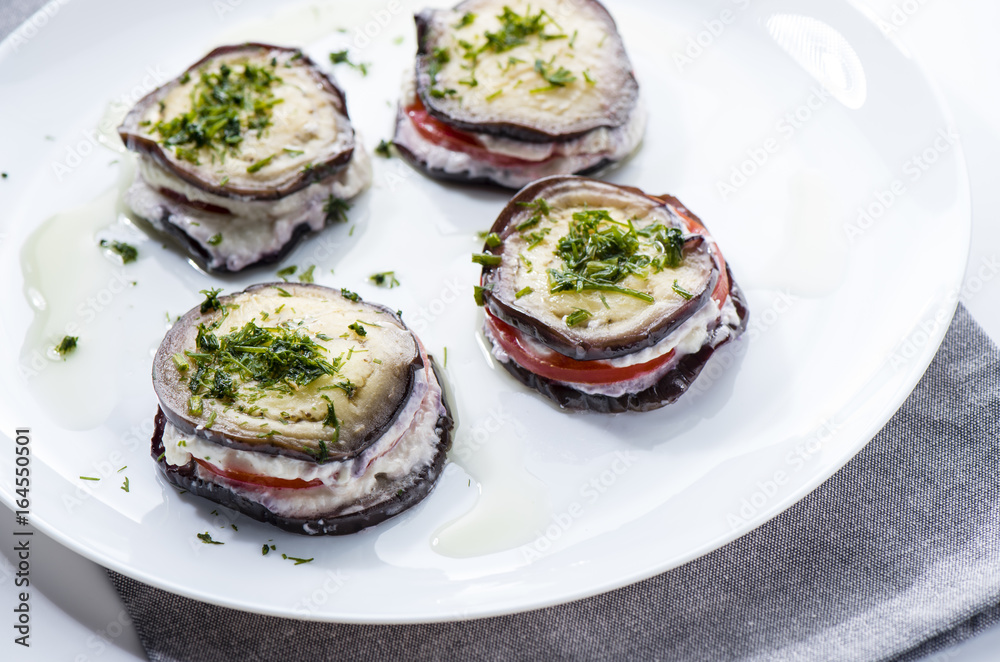 Fried eggplants with garlic and tomato Fried eggplants with garlic and tomato