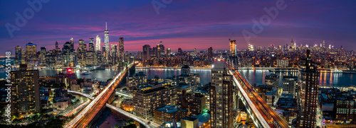 View over Manhattan and Brooklyn skyline during sunset