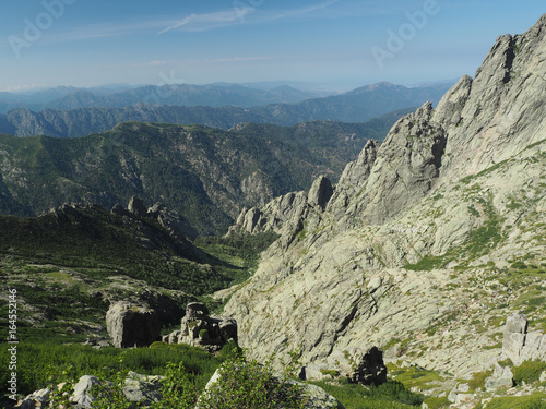 Fototapeta Naklejka Na Ścianę i Meble -  high mountain view scenery with sharp boulders nad blue sky