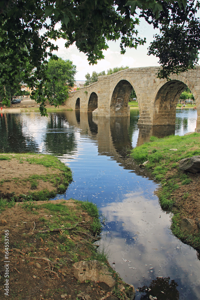 Countryside, ancient bridge and river