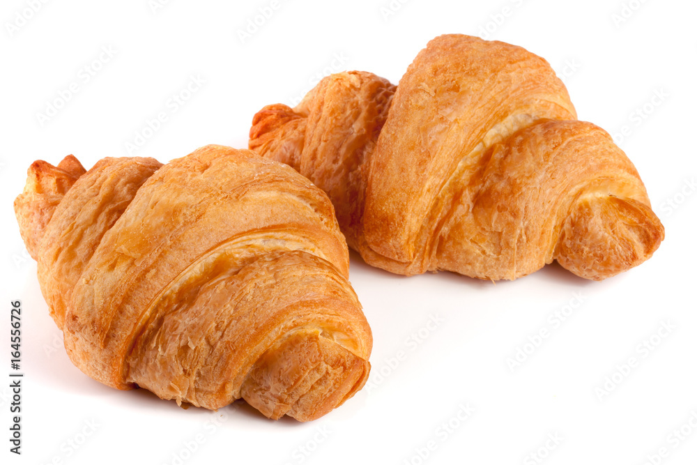 two croissant isolated on white background closeup two croissant isolated on white background closeup