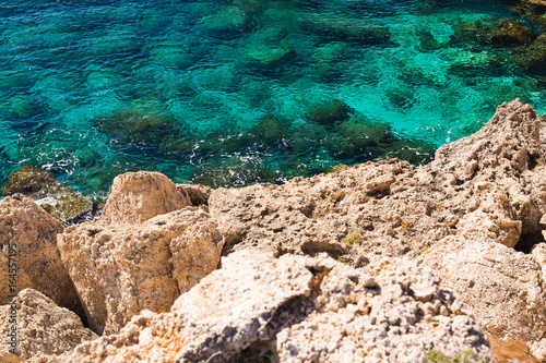 Rock cliffs and sea bay with azure water near Protaras  Cyprus island.