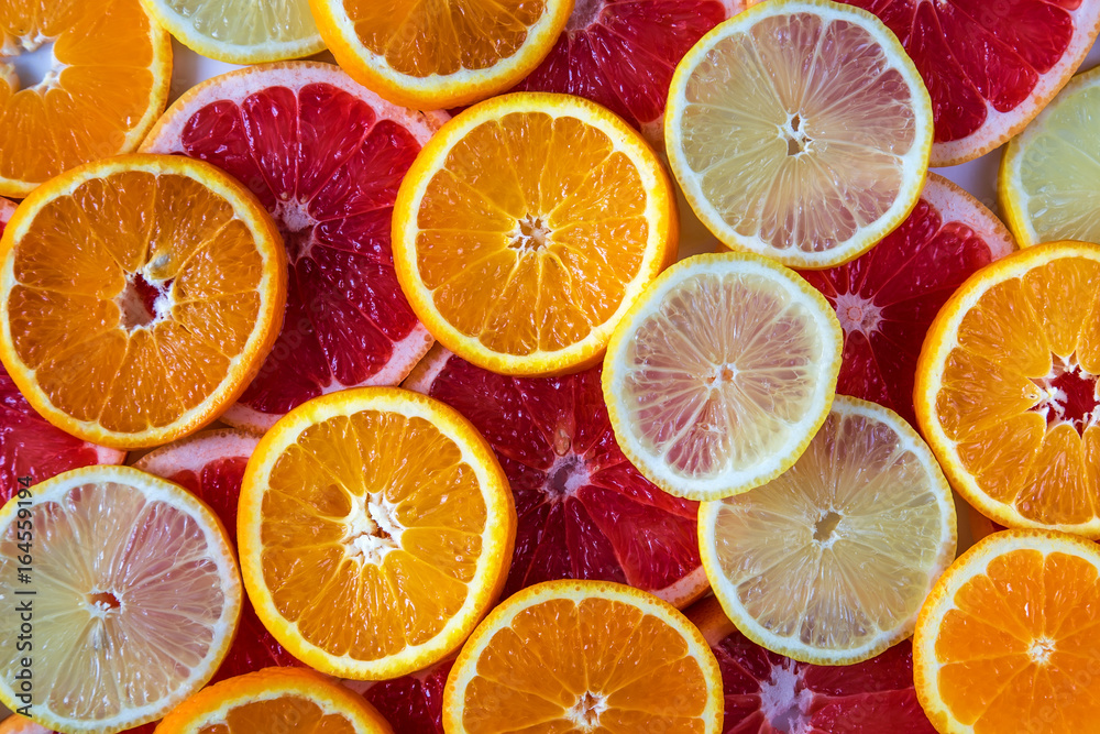 Fresh sliced fruit orange lemon grapefruit Fresh sliced fruit orange lemon grapefruit