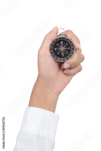 closeup compass in hand isolated on white background