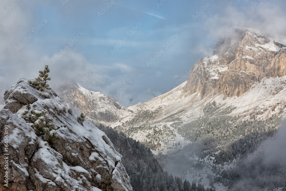 Mountains Cinque Torri (The Five Pillars), covered with snow, early autumn, Dolomites, Italy