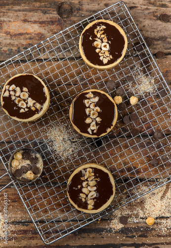 Chocolate tarts  with hazelnuts