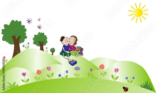 Pareja de enamorados sentados en el monte.