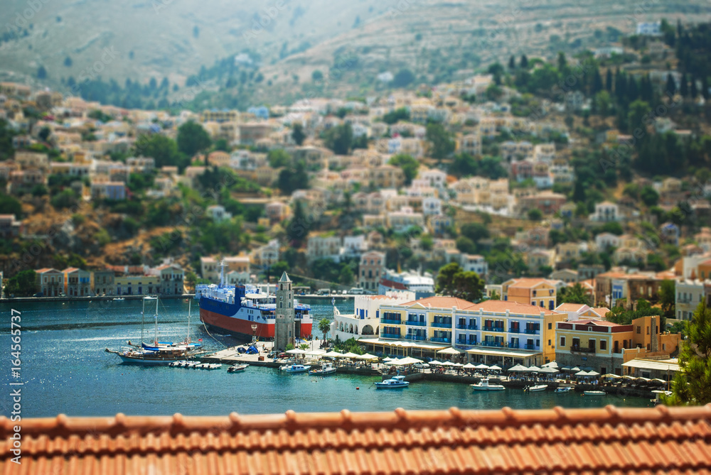 The beautiful Greek island of Symi, and views of the harbor with boats and yachts