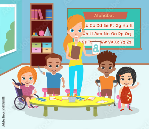 A special class of disabled children. Children with disabilities and the teacher greet and wave their hands. Learning the alphabet