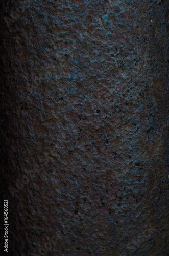 The textured background of old, rusted metal