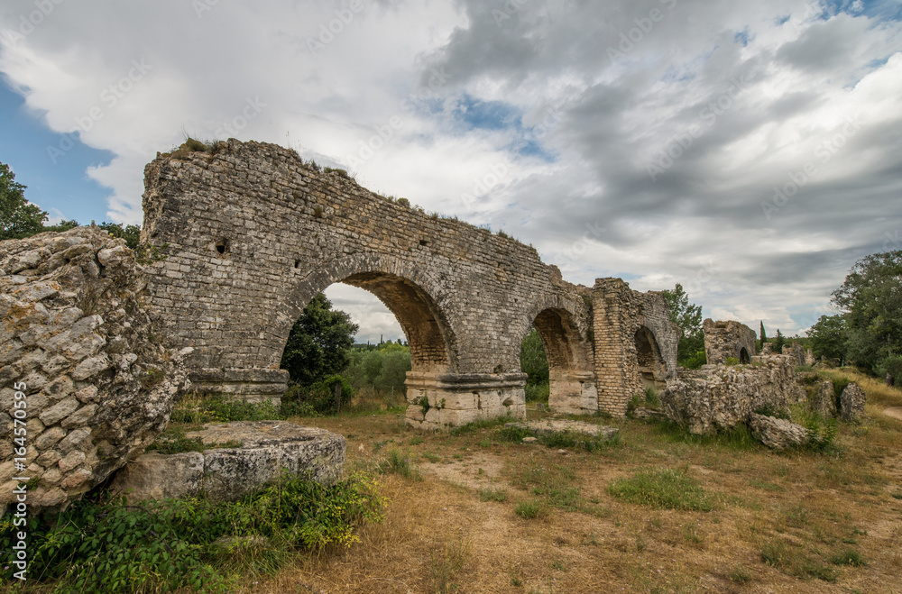 Ruines of Roman aqueduct near Fontvieille in Provence region of France