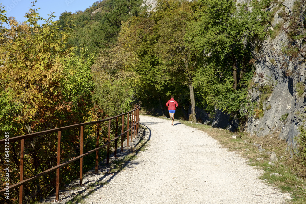 Man running in Val Rosandra valley near Trieste