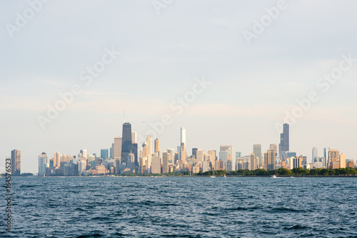 Hazy view of the Chicago skyline with Lake Michigan in the foreground © Page Light Studios